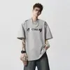 Nueva Marca de Streetwear de Moda Top Holgado de Manga Corta con Hombros Normales, Camiseta de Manga Corta de Verano con Cuello Redondo y Estampado de Letras Láser para Hombre