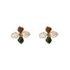 Pendientes de Flor Plateada Estilo Francés Romántico Retro Elegante Suave Estilo Hong Kong Empalme de Color Artístico Esmalte Pendientes de Flor de Cuatro Hojas para Mujer