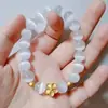 Moda Ins Pequena Flor de Pessegueiro Presente Seguro Pulseira Olho de Gato para Meninas