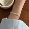 2025 Nova Pulseira de Pérolas de Cristal Contas Design de Nicho Feminino Personalizada Versátil Pulseira Acessórios para Mão Atacado