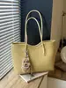 Bolsa de ombro feminina transfronteiriça 2026 nova, bolsa tote simples e casual, grande capacidade, estilo retrô, adequada para escola e trajeto