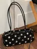 Bolso de axila de nicho estilo coreano Shuai Mi Jia para mujer, nuevo modelo de moda otoño 2026, bandolera baguette simple para el día a día