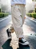 Pantalones Casuales de Primavera y Otoño para Niños y Niñas Moda Infantil Personalidad Tendencia Estilo Coreano Parche de Dibujos Animados Elegante Ropa de Trabajo Pantalones Largos