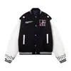 Elegante y minimalista chaqueta de béisbol de lana bordada estilo japonés, una pieza de moda Harajuku de moda con un look relajado y chic, nuevo color negro