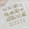 Accesorios para Uñas Artísticas Caja de 12 Compartimentos Mariposa Metálica Mixta Cuervo Corazón Cruz Cinta Lazo Decoración para Uñas de Forma Especial