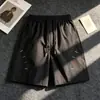 Shorts bordados de dopamina de moda para hombres y mujeres, pantalones casuales de verano, shorts rectos holgados de secado rápido
