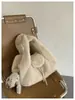 Bolso de mujer elegante de alta gama 2026 nuevo de moda versátil de felpa de mano de un solo hombro moda retro bolso cubo
