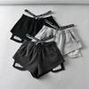 Shorts Casuais Esportivos de Rua Feminino Verão Cintura Exposta Elástico Personalidade Estampado Falso Duas Peças Calças de Yoga para Comércio Exterior Atacado