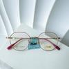 Nuevas gafas retro ultraligeras y cómodas de titanio puro con montura para miopía, moda mixta, venta al por mayor multilateral