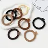 Nueva banda para el cabello elástica duradera de alta elasticidad, liga para el cabello, banda de goma para el cabello, accesorios simples para el cabello de mujer, cuerda para el cabello, tocado de alto sentido, cuerda para el cabello al por mayor