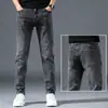 Jeans masculinos grossos, de corte justo e perna reta para outono e inverno, novos calças compridas casuais e versáteis para homens 2026