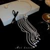 Collar Europeo y Americano Viento Frío Diamante Lazo Estrella Borla Collar Temperamento Alto Sentido Cadena Clavícula Collar Moda Personalidad