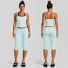 Conjunto de yoga transfronterizo con color contrastante, hermoso top deportivo de cuello halter en la espalda, conjunto de pantalones de yoga y fitness Pilates de secado rápido de cintura baja