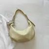 Bolso de axila de gran capacidad estilo coreano para mujer, nuevo modelo de verano 2026, bolso simple de color liso tipo bollo, bolso de hombro y cruzado