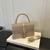 Bolso de mano de estilo coreano con decoración de hebilla de cinturón en relieve, textura 2026, bolso de mano simple de lujo ligero, de un solo hombro, cruzado