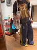 Calça de Moletom Larga com Cordão Design de Três Listras Estilo Americano Novo Estilo Unissex Solta Casual Versátil Calça Longa de Perna Reta