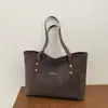 La popular bolsa de mano retro de este año para mujer, nuevo estilo Otoño 2026, color liso, simple, bolso de un solo hombro, para ir al trabajo, bolso de axila