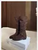 Aumento de Altura 2026 Botas Vaqueras Planas de Tira Cruzada de Moda Punta Redonda Caña Media Botas de Caballero Botas Largas Botas Holgadas para Mujer