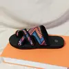 Sandalias de playa para mujer, punta plana, de comercio exterior, video real, nuevo diseño, cabeza redonda, tallas 36-41-42-43, talla grande