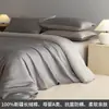 Juego de ropa de cama de cuatro piezas de algodón de fibra larga de Xinjiang Clase A 100s modelo nuevo 2026 funda de edredón de algodón puro antiácaros, sábana y sábana bajera
