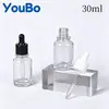 Em estoque Frasco de vidro transparente de 30ml com conta-gotas escalonado para base líquida, óleo essencial e sérum