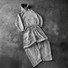 Traje casual de moda novo outono e inverno transfronteiriço 2026, cor sólida, design simples de padrão bordado, corte solto, unissex