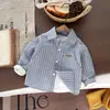 Camisa para niño 2026 primavera y otoño nuevo estilo camisa a rayas bordada de cachorro top versátil casual de manga larga para niños pequeños y medianos