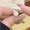 Brinco de Argola Popular Estilo TikTok Olho de Gato Exquisito Leve Luxo Alta Sensação Temperamento Design Minimalista Estilo Ins