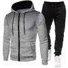 Colección Otoño/Invierno 2026: Sudadera deportiva unisex de lunares con forro polar, conjunto de sudadera con cremallera y pantalones de chándal de color liso para hombre