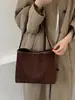 Nova bolsa feminina de comércio exterior, bolsa de balde retrô estilo coreano de grande capacidade para o dia a dia, bolsa de ombro de nicho elegante e versátil, bolsa de ombro da moda.