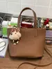 Bolsa de Mão Tendência Estilo Coreano Transfronteiriça Nicho Nova Primavera 2026 Bolsa Saco de Alta Qualidade para Mulheres Bolsa de Ombro Transversal Casual