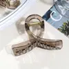 Novo Prendedor de Garra para Cabelo Simples de Tamanho Médio Estilo Transfronteiriço para Penteados Semi-Presos, Acessório de Cabelo Tipo Pinça Shark para Mulheres Atacado