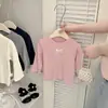 Ropa interior para niñas estilo coreano Primavera y Otoño 2025 Nuevo estilo Camiseta de manga larga con lazo para bebé Ropa versátil para bebé