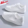 Zapatos de mujer sin cordones, zapatillas finas y transpirables, zapatos casual versátiles, zapatos blancos de cuero para mujer, estilo de pareja, venta al por mayor de zapatos de mujer