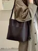 Bolsa de mão da moda deste ano para mulheres, grande capacidade, nova bolsa de ombro cruzada tipo balde retrô outono e inverno 2026