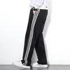 Pantalones deportivos para hombre de cintura elástica para primavera y otoño para el trabajo holgados diarios largos rectos tres rayas pantalones casuales hombre