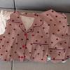 Pijama mujer otoño coreano estudiantes travieso lindo estampado completo amor traje de pantalón de manga larga ropa de casa disparo real venta al por mayor