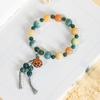 Pulsera de bodhi de flor flotante en polvo natural para hombres y mujeres camelia anillo individual pulsera de mano cuentas cuentas texto placa de juego cuerda venta al por mayor