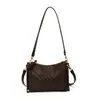 Elegante y simple bolso de mano para mujer 2026 nueva moda bolso de hombro tejido nicho commuter versátil bolso cruzado