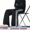Calça de moletom esportiva listrada estilo americano para homens, nova marca da moda de outono, calça casual larga reta solta de peso pesado