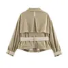 Fabricante mayorista de ropa de mujer transfronteriza 2026 Estilo europeo y americano color liso versátil entallador a la cintura gabardina corta flockeada