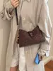 Bolsa vintage esmerilada de otoño e invierno para mujer, nuevo bolso cruzado versátil de moda 2026, bolso de hombro tipo cubo popular para ir al trabajo