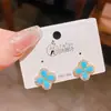 Pendientes de Flor de Cuatro Hojas de Zirconia Turquesa Imitación Retro de Aguja Plateada de Lujo Ligero de Gama Alta Pendientes Clásicos Retro Estilo Chino Nuevo