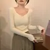 Al por mayor transfronterizo coreano otoño e invierno estilo extranjero cuello en V ajustado Joker manga larga camiseta suéter interior elegante top para mujer