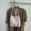 Bolso de diseño de nicho moderno y a la moda, bolso cruzado de cubo simple casual de primavera nuevo transfronterizo para mujer