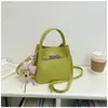 Bolso Cubo de Mano de Nicho Estilo Coreano para Mujer 2026 Primavera Nuevo Moda Bolso de Hombro Único Bolso Cruzado Simple de Alto Valor
