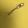 Acessórios de hardware DIY, chaveiros de metal, argola única, argola chata, corrente de suspensão em liga, chaveiro, pingente de boneca