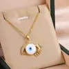 Colar Cruzado Europeu e Americano Novo Olho Turco do Diabo para Homens e Mulheres Banhado a Ouro Gota de Óleo de Palma Olho Pingente de Fátima