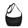 Bolsa Casual de Nylon Estilo Bolinho para Mulheres 2025 Nova Moda Simples Bolsa de Ombro Transversal Leve Versátil Pequena