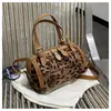 Bolso de mano tejido de diseño nicho transfronterizo bolsa almohada bolso de mujer estilo nuevo diseño retro bolso Boston bolso de hombro cruzado